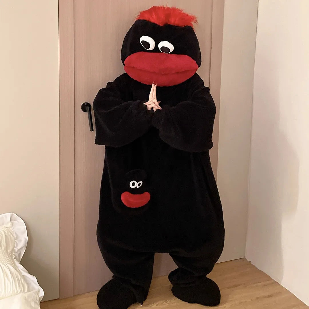 Black Big Mouth Monster onesie with red hair and red mouth